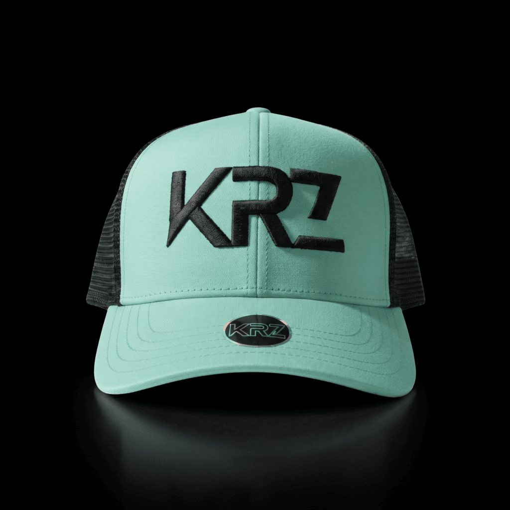 KRZ Green & Black Trucker Cap featuring a structured green front, matching green mesh back, curved green peak and premium black embroidered KRZ logo. Finished with the signature KRZ brim badge and presented as part of the KRZ Official premium streetwear collection.